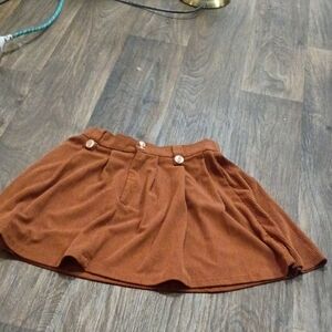 Women’s Rust Brown Mini Skirt with Button Detail